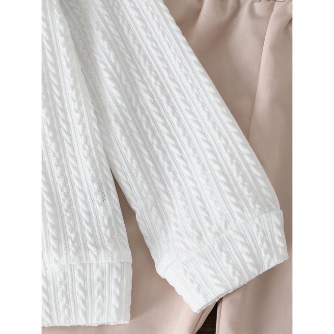 Ensemble chic garçon – polo blanc et pantalon beige
